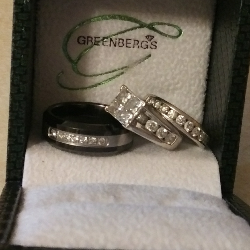Princess quad wedding ring set valued at 10,000